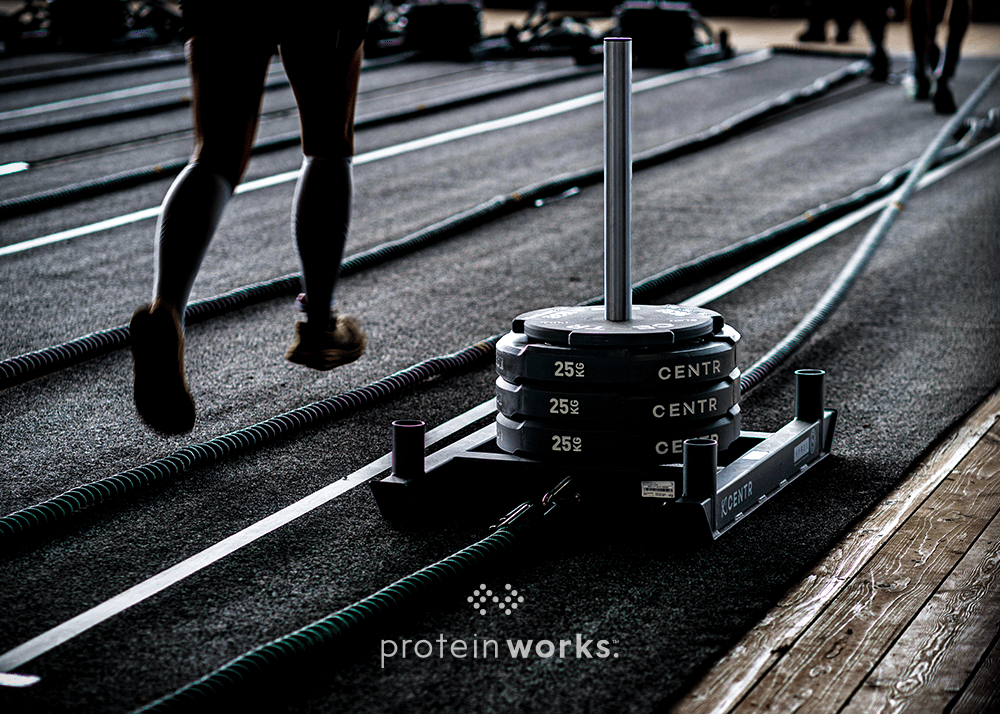 weighted sled being pulled by a hyrox participant 
